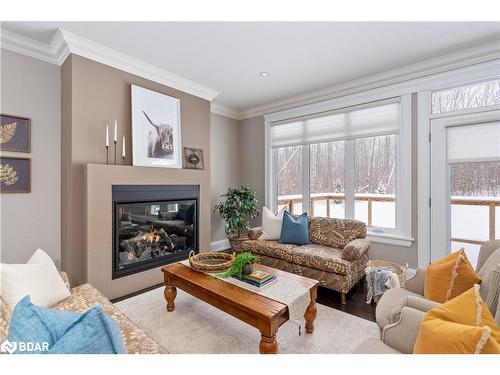 64 Heron Boulevard, Springwater, ON - Indoor Photo Showing Living Room With Fireplace