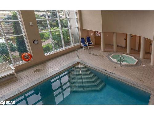 407-6 Toronto Street, Barrie, ON - Indoor Photo Showing Other Room With In Ground Pool