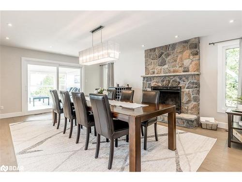 31 Bay Street, Oro-Medonte, ON - Indoor Photo Showing Dining Room With Fireplace
