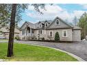 72 Luella Boulevard, Springwater, ON  - Outdoor With Facade 