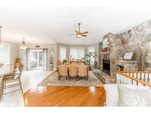 72 Luella Boulevard, Springwater, ON - Indoor Photo Showing Living Room With Fireplace