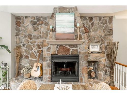 72 Luella Boulevard, Springwater, ON - Indoor Photo Showing Living Room With Fireplace