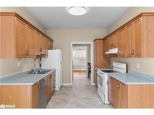 28 Ritchie Crescent, Elmvale, ON - Indoor Photo Showing Kitchen With Double Sink