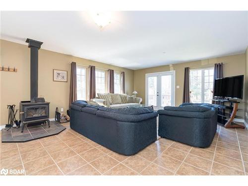139 Trout Lane, Tiny, ON - Indoor Photo Showing Living Room With Fireplace