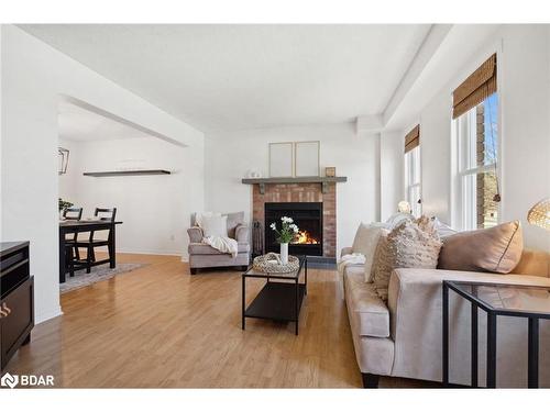 114 Cecil Street, Essa, ON - Indoor Photo Showing Living Room With Fireplace