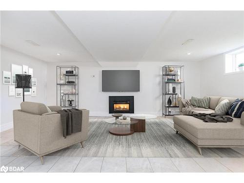 7 Glacier Trail, Tay, ON - Indoor Photo Showing Living Room With Fireplace