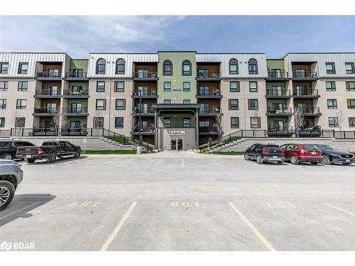 404-6 Spice Way, Barrie, ON - Outdoor With Balcony With Facade
