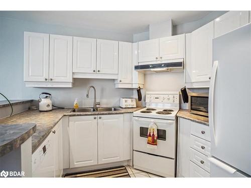 502-2 Toronto Street, Barrie, ON - Indoor Photo Showing Kitchen With Double Sink