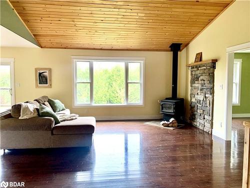 33 Little Cove Road, Tobermory, ON - Indoor Photo Showing Living Room With Fireplace