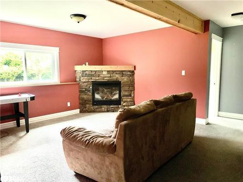 33 Little Cove Road, Tobermory, ON - Indoor Photo Showing Living Room With Fireplace