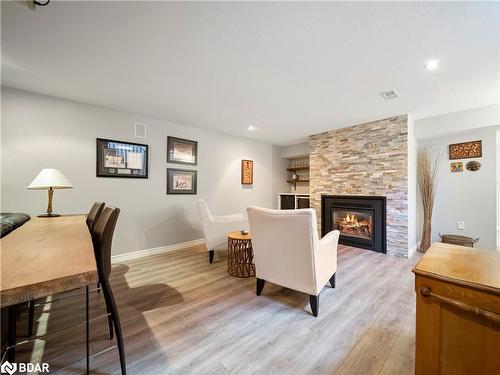 4174 Forest Wood Drive, Severn, ON - Indoor Photo Showing Other Room With Fireplace