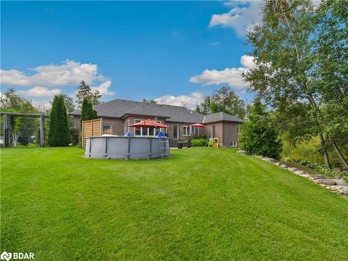 4174 Forest Wood Drive, Severn, ON - Outdoor With Above Ground Pool With Backyard