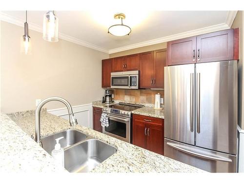 241-130 Fairway Court, The Blue Mountains, ON - Indoor Photo Showing Kitchen With Stainless Steel Kitchen With Double Sink