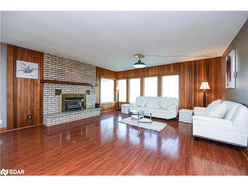 2146 Innisfil Beach Road, Innisfil, ON - Indoor Photo Showing Living Room With Fireplace