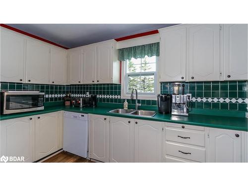 1743 Golf Course Road, Springwater, ON - Indoor Photo Showing Kitchen With Double Sink