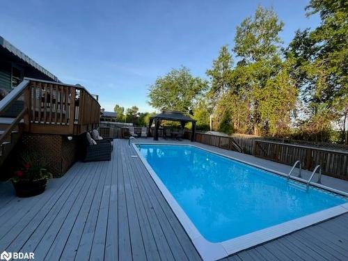 24 Dancy Drive, Orillia, ON - Outdoor With In Ground Pool With Deck Patio Veranda