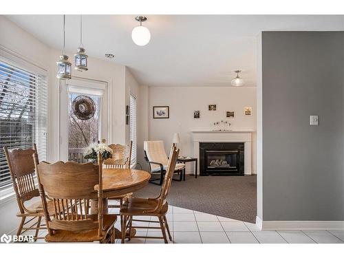 9 Lang Drive, Barrie, ON - Indoor Photo Showing Dining Room With Fireplace