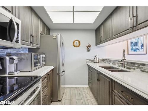 807-75 Ellen Street, Barrie, ON - Indoor Photo Showing Kitchen With Double Sink