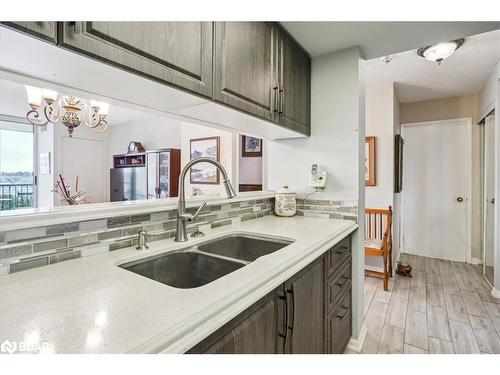 807-75 Ellen Street, Barrie, ON - Indoor Photo Showing Kitchen With Double Sink