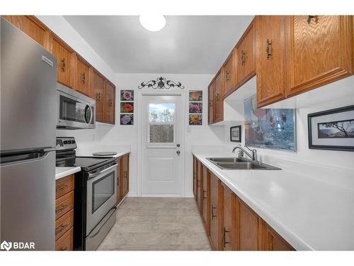 307-1 Quail Crescent, Barrie, ON - Indoor Photo Showing Kitchen With Double Sink