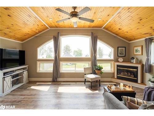 5632 Penetanguishene Road, Springwater, ON - Indoor Photo Showing Living Room With Fireplace