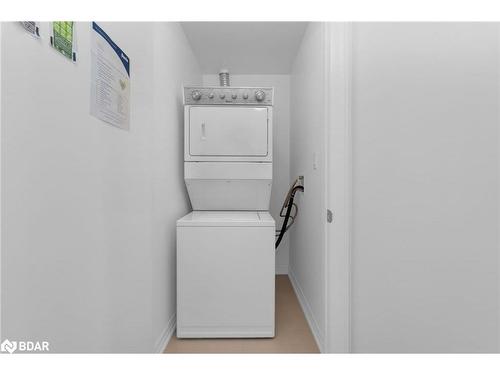 709-111 Worsley Street, Barrie, ON - Indoor Photo Showing Laundry Room