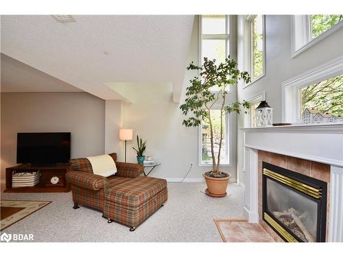 30 Nicklaus Drive, Barrie, ON - Indoor Photo Showing Living Room With Fireplace