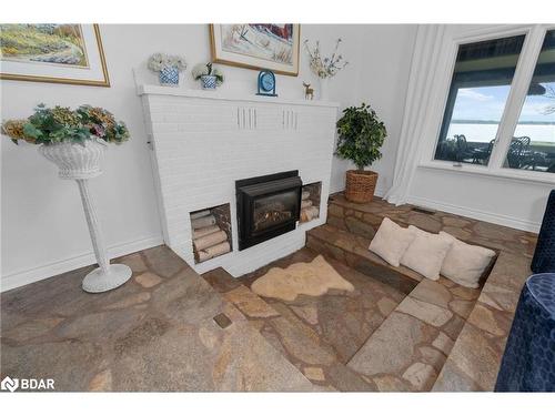 3615 Bayou Road, Orillia, ON - Indoor Photo Showing Living Room With Fireplace