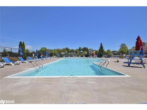 167-11 Summer Village Lane, Cherry Valley, ON - Outdoor With In Ground Pool
