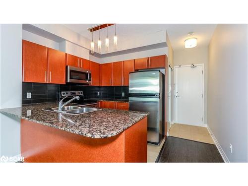 312-3515 Kariya Drive, Mississauga, ON - Indoor Photo Showing Kitchen With Double Sink