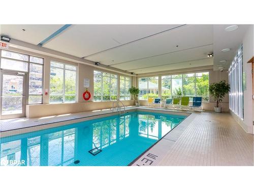 312-3515 Kariya Drive, Mississauga, ON - Indoor Photo Showing Other Room With In Ground Pool