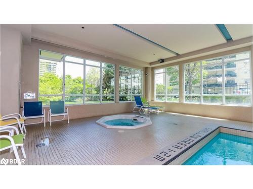 312-3515 Kariya Drive, Mississauga, ON - Indoor Photo Showing Other Room With In Ground Pool