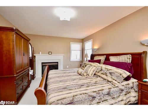 167 Crompton Drive, Barrie, ON - Indoor Photo Showing Bedroom With Fireplace