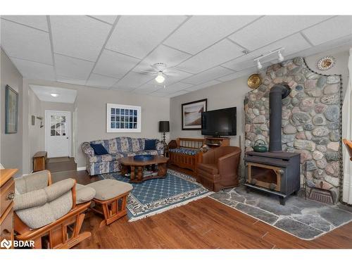 2200 South Orr Lake Rd Road, Springwater, ON - Indoor Photo Showing Living Room With Fireplace