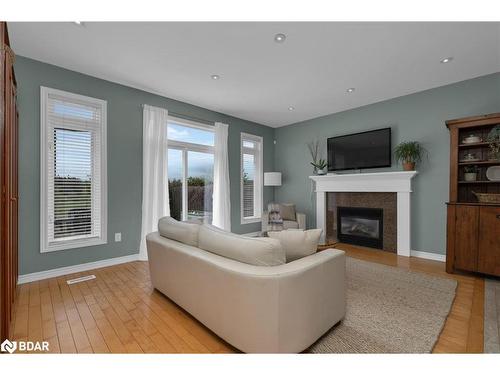 54 Ellis Crescent, Lindsay, ON - Indoor Photo Showing Living Room With Fireplace