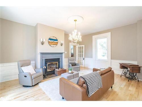 7001 County Road 27, Innisfil, ON - Indoor Photo Showing Living Room With Fireplace