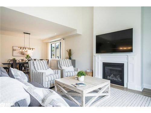 102 Reed Way, The Blue Mountains, ON - Indoor Photo Showing Living Room With Fireplace