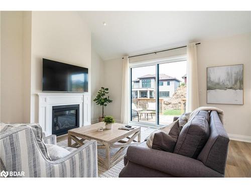 102 Reed Way, The Blue Mountains, ON - Indoor Photo Showing Living Room With Fireplace