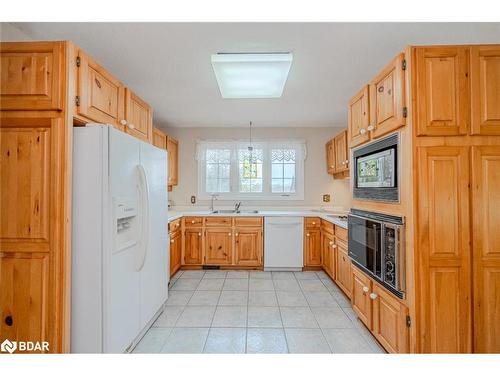 2621 Crossland Road E, Springwater, ON - Indoor Photo Showing Kitchen With Double Sink