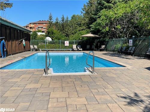 103-25 Meadow Lane, Barrie, ON - Outdoor With In Ground Pool With Backyard