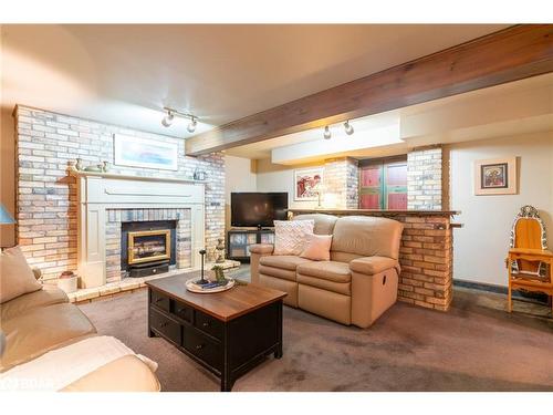 219 Bayshore Road, Innisfil, ON - Indoor Photo Showing Living Room With Fireplace