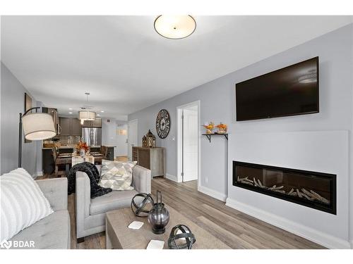 G01-80 Horseshoe Boulevard, Oro-Medonte, ON - Indoor Photo Showing Living Room With Fireplace