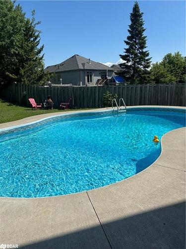 22 Mariposa Drive, Orillia, ON - Outdoor With In Ground Pool With Backyard