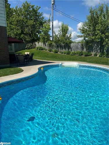 22 Mariposa Drive, Orillia, ON - Outdoor With In Ground Pool With Backyard