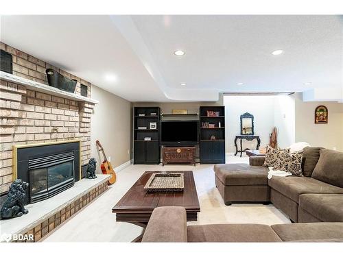 1826 Quantz Crescent, Innisfil, ON - Indoor Photo Showing Living Room With Fireplace
