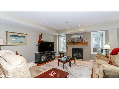 28 Masters Crescent, Port Severn, ON - Indoor Photo Showing Living Room With Fireplace