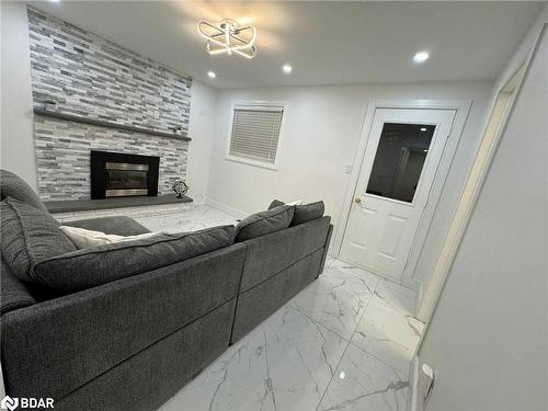 72 Jane Crescent, Barrie, ON - Indoor Photo Showing Living Room With Fireplace