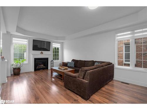 2177 Galloway Street, Innisfil, ON - Indoor Photo Showing Living Room With Fireplace