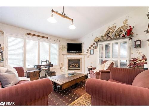 185 Tyrolean Lane, The Blue Mountains, ON - Indoor Photo Showing Living Room With Fireplace