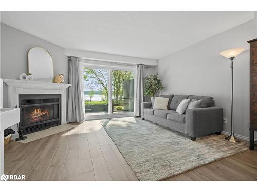 4-1 Olive Crescent, Orillia, ON - Indoor Photo Showing Living Room With Fireplace
